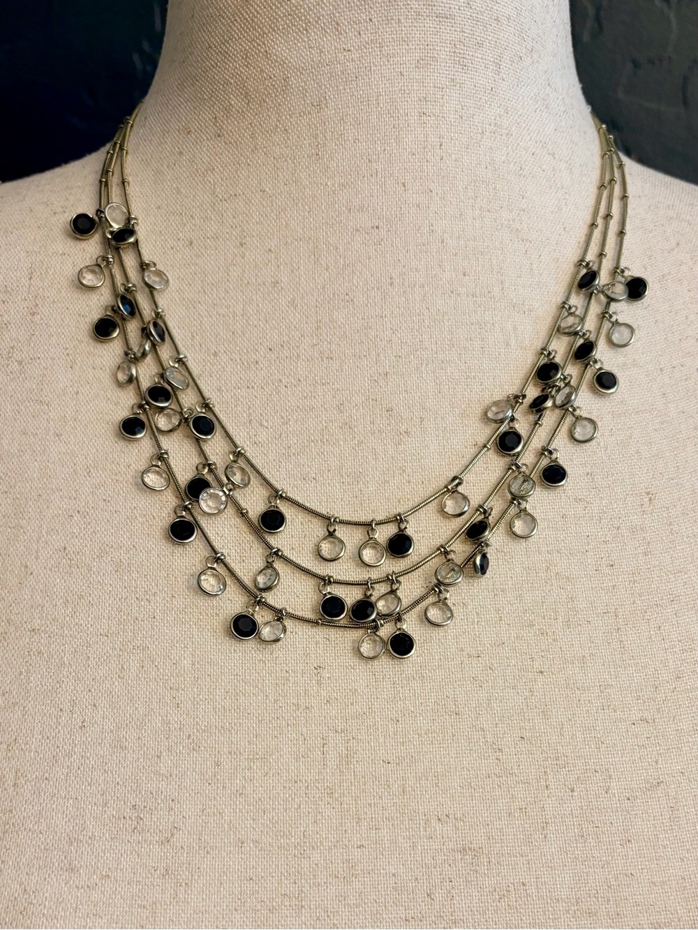 Anne Klein Multi-Strand Necklace with Black and Clear Discs